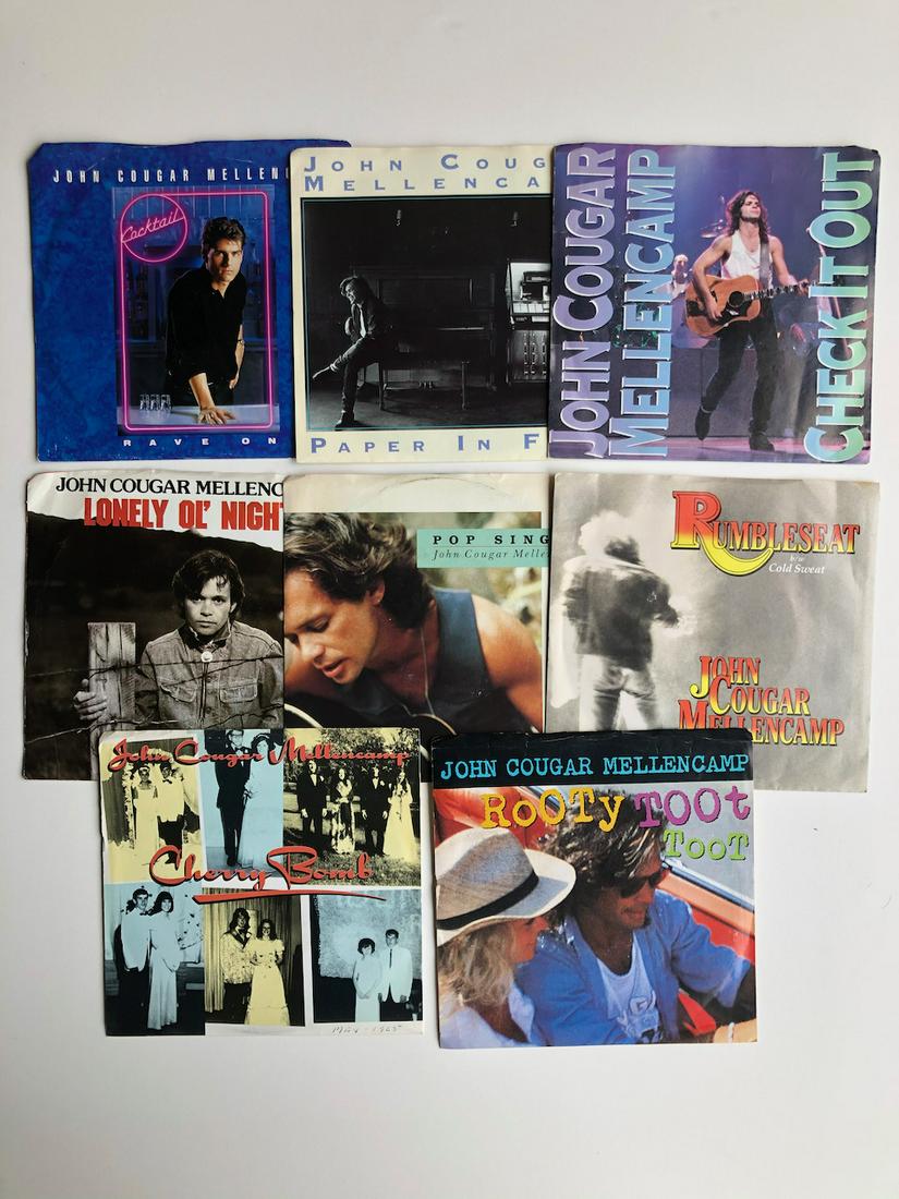 JOHN COUGAR MELLENCAMP PICTURE SLEEVE 45s SET: JOHN COUGAR MELLENCAMP PICTURE SLEEVE 45s SET INCLUDING: John Cougar Mellencamp – Rumbleseat Label: Riva (2) – 884 856-7 Format: Vinyl, 7", Single Country: US Released: 1985 - AND - John Cougar Me
