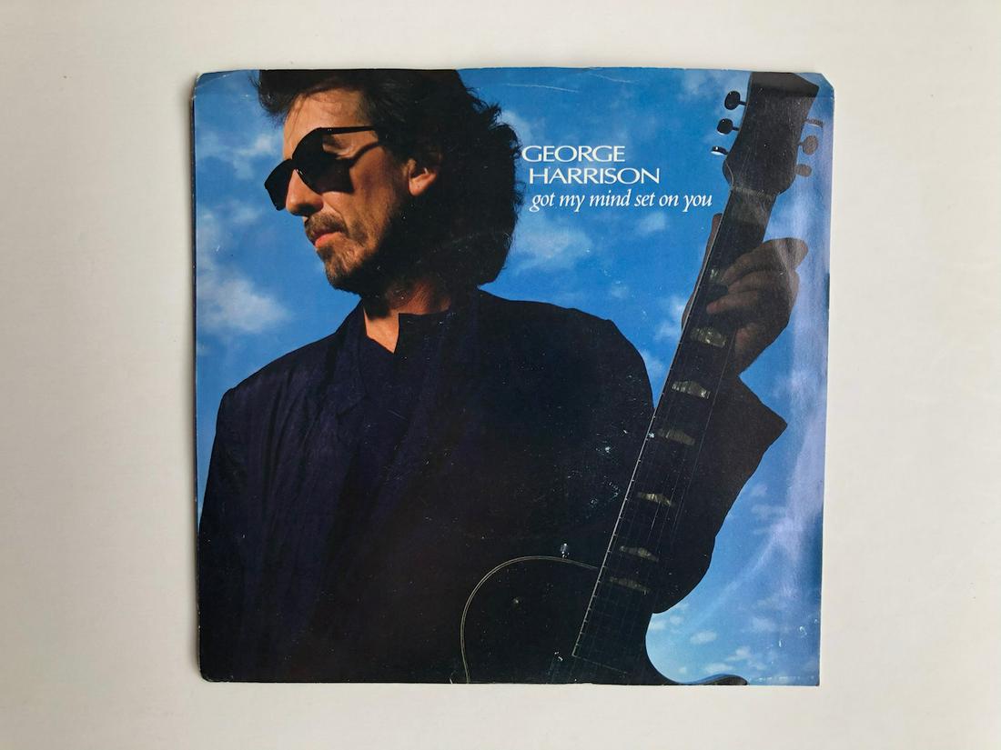 GEORGE HARRISON PICTURE SLEEVE 45RPM RECORD: GEORGE HARRISON PICTURE SLEEVE 45RPM RECORD George Harrison – Got My Mind Set On You Label: Dark Horse Records – 7-28178 Format: Vinyl, 7", 45 RPM, Single Released: 1987 Reserve: $3.00 Shipping: D