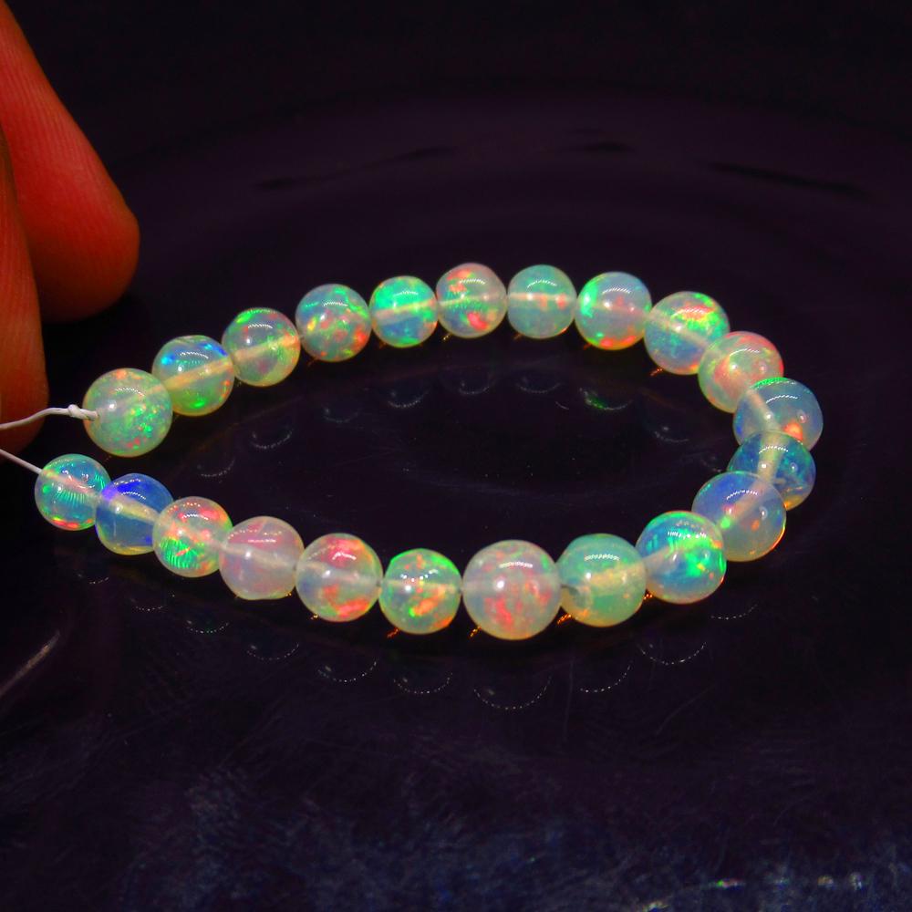 10.55 Ct Natural 22 Drilled Multi-Color Fire Opal Ball (1 of 2)
