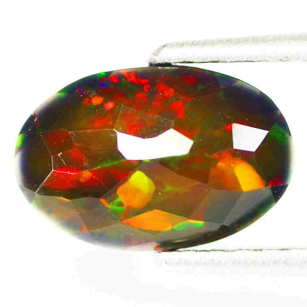 1.39Ct Oval cut 11 x 7mm 3D Multi color Disco Black (1 of 2)