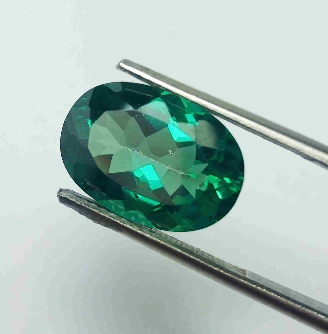 6.86 CTS NATURAL GREEN TOPAZ OVAL SHAPE GOOD COLOR (1 of 3)