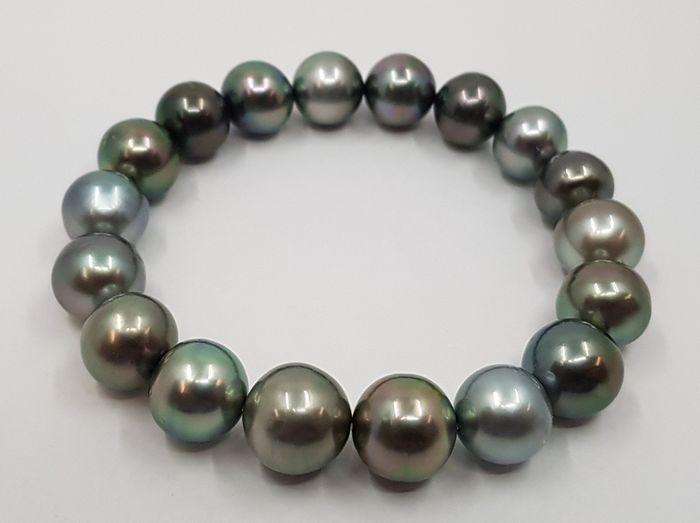10x11.5mm Shimmering Tahitian Pearls Tahitiaanse parels: Title: 10x11.5mm Shimmering Tahitian Pearls Tahitiaanse parels - Armband Description: This beautiful pearl bracelet features a row of lustrous multi coloured Tahitian pearls measuring 10x11.5mm. Grown