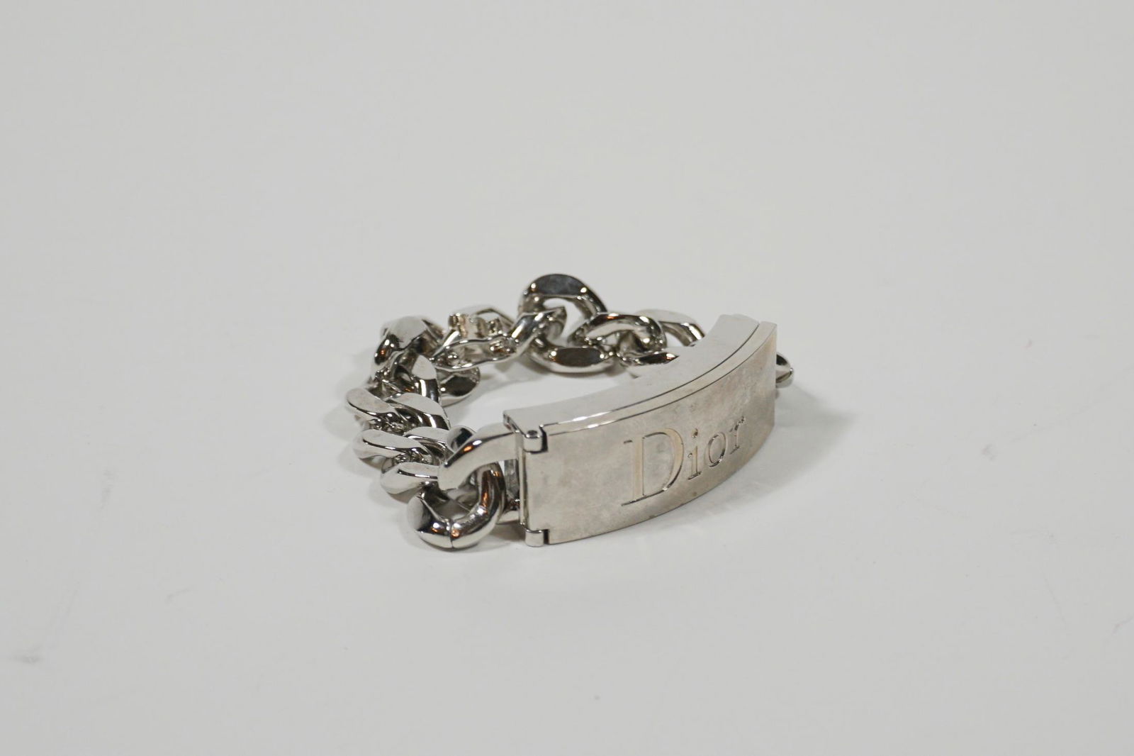 Dior Chunky Charm Bracelet: Title: Dior Chunky Charm Bracelet Brand/Designer: Dior Materials: Silver Dimension: N/A Additional Information: Dior Chunky Charm Bracelet Preowned items have wear and can be damaged. Check picutres t