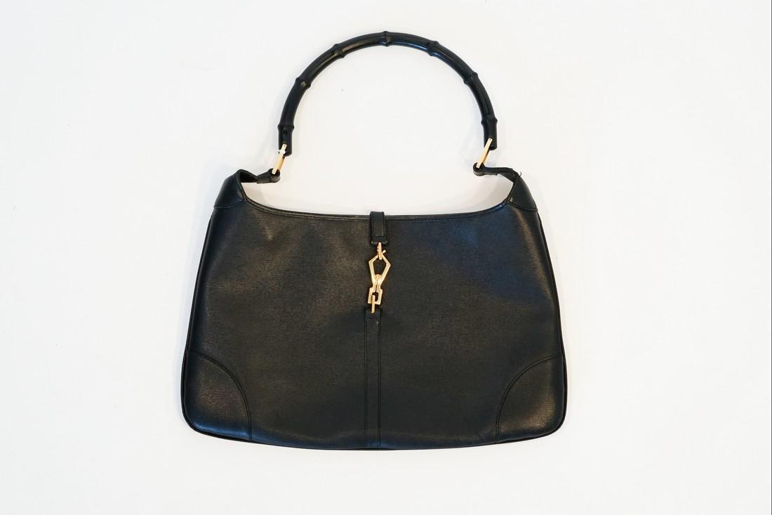 Gucci Bamboo Handbag: Title: Gucci Bamboo Handbag Brand/Designer: Gucci Materials: Leather, bamboo Dimension: L16.5 W.5 H12.5 SD7 Additional Information: Gucci Bamboo HandbagPreowned items have wear and can be damaged. Che