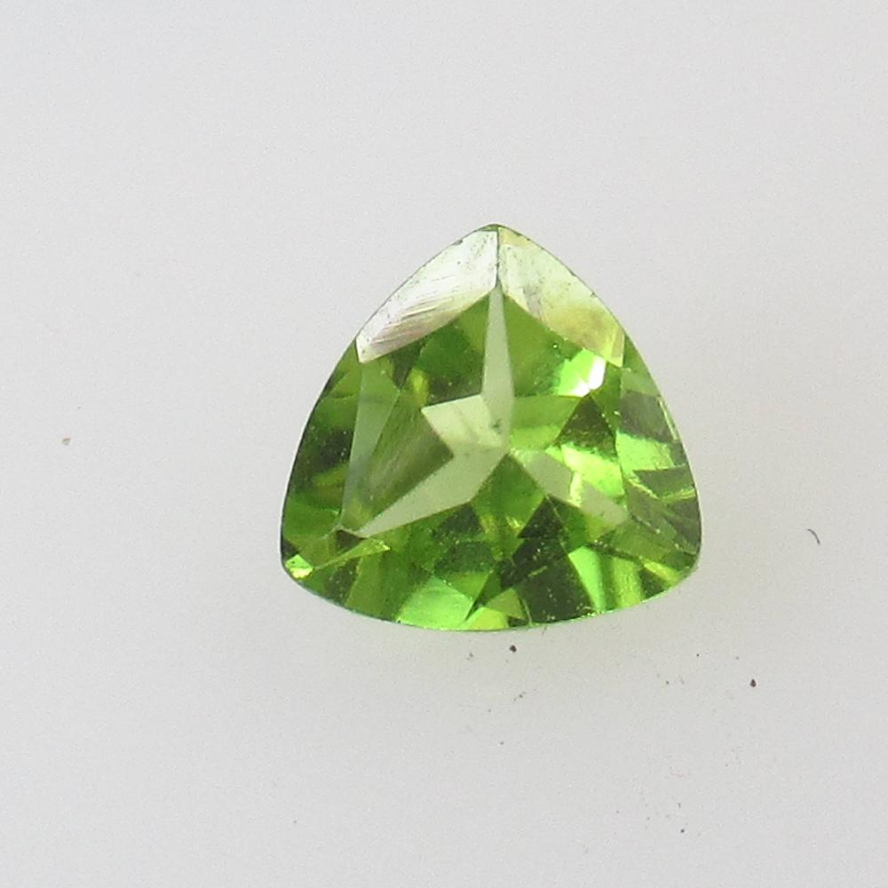 1.13 Ctw Natural Peridot Trillion Cut: No Reserve! Title: 1.13 Ctw Natural Peridot Trillion Cut Stone Clarity: VVS Gemstone: Peridot Carat Weight: 1.13 Size/Dimensions: 7.00 x 7.00 x 3.80 mm Additional Information: Top Class Luster / Excel