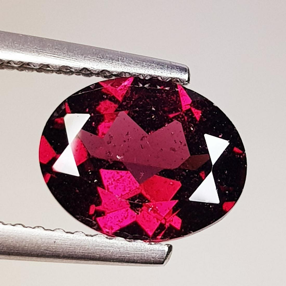 Natural Rhodolite Garnet Oval Cut 2.21 ct: No Reserve! Title: Natural Rhodolite Garnet Oval Cut 2.21 ct Color/Clarity: VVS - VS Carat Weights: 2.21 Size/Dimensions: 9.01 x 7.15 x 4.01 Additional Information: Oval - Burma Shipping: Domestic: Fl