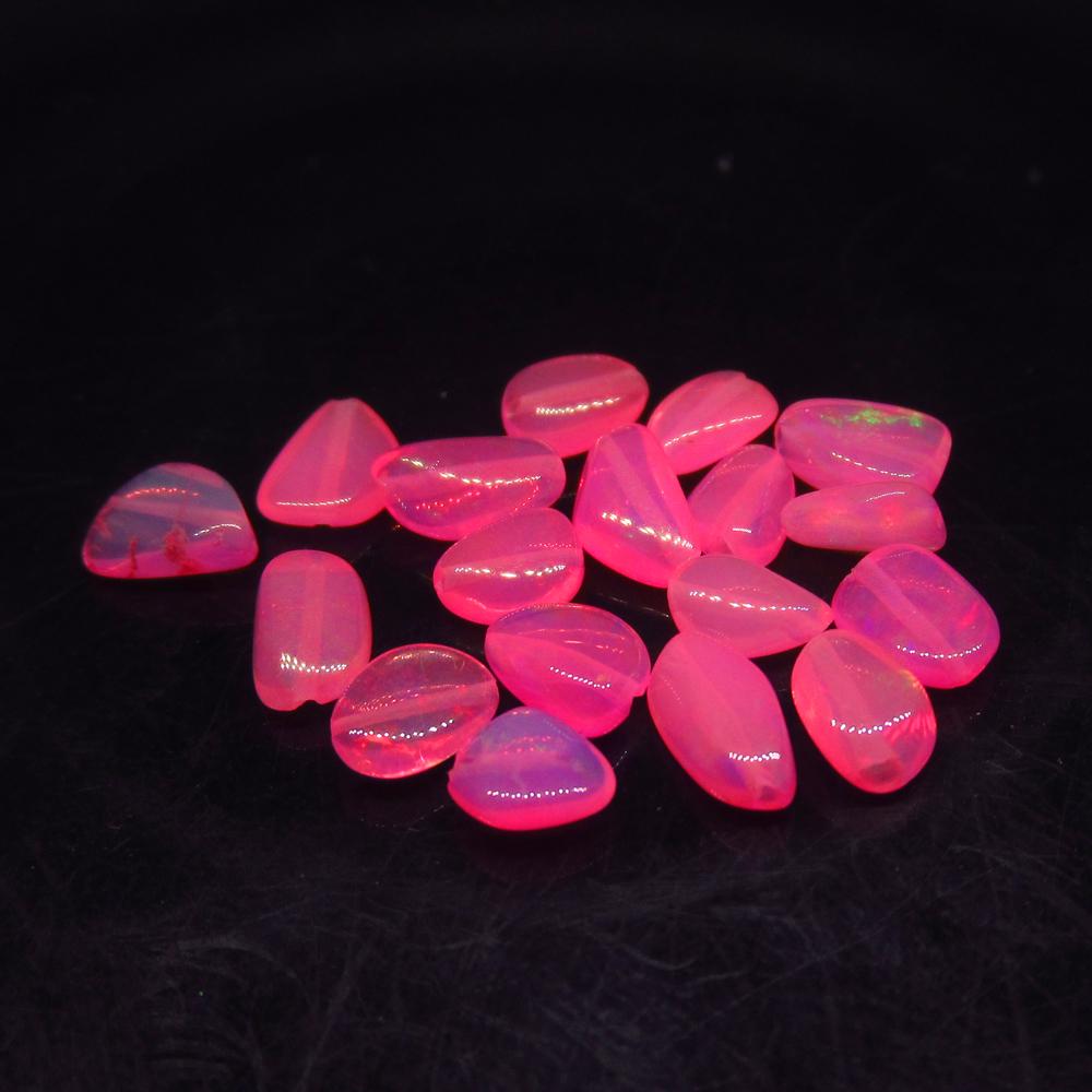 3.55 Ct Natural 18 Drilled Pink Fire Opal Beads: No Reserve! Title: 3.55 Ct Natural 18 Drilled Pink Fire Opal Beads Stone Clarity: Translucent Gemstone: Natural Pink Opal Beads Carat Weight: 3.55 Size/Dimensions: 5.0x4.0 to 6.6x3.3 mm / 18 PC's Addi