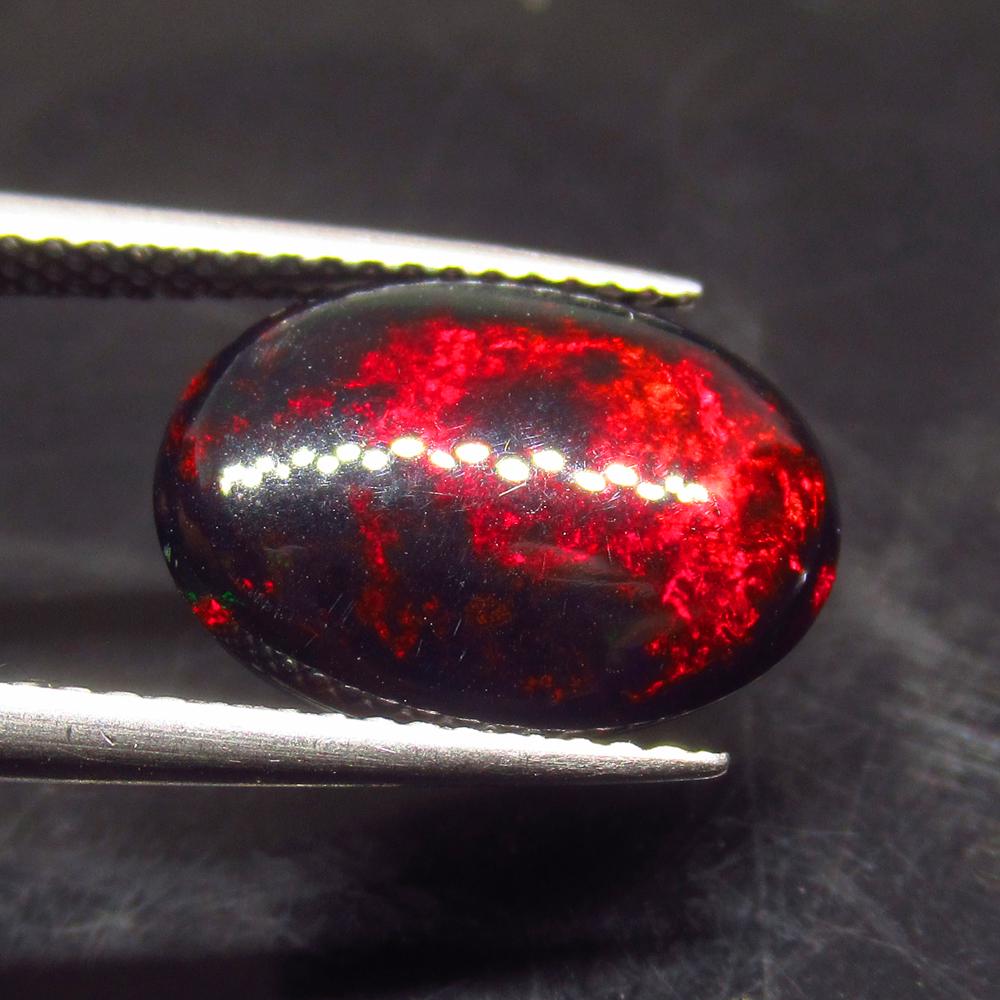 3.82 Ct Natural Ethiopian Black Fire Opal Oval Cab (1 of 2)