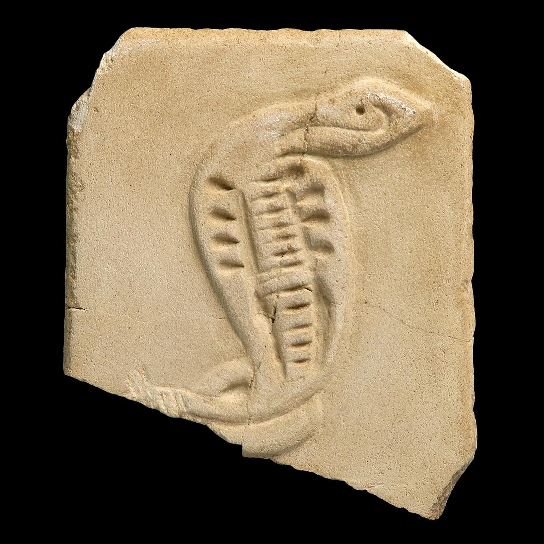 Egyptian Limestone High-Relief Uraeus, c. 1700 B.C.: Title: Egyptian Limestone High-Relief Uraeus, c. 1700 B.C. Date/Period: Egypt, c. 1700 B.C. Dimension: 9.2 cm L - 3 9/16 inches Material: Limestone Description: Deeply carved in high-relief with a fin