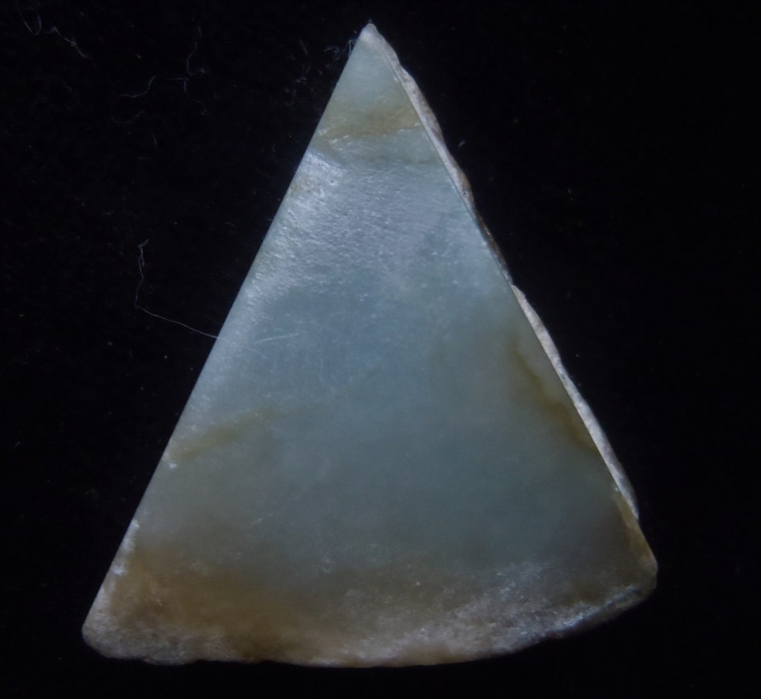 17.94 GRAM GENUINE BURMESE JADEITE JADE: Title: 17.94 GRAM GENUINE BURMESE JADEITE JADE Origin: Hpakant, Kaching State, Myanmar Size: 3.5x3x1.3 cm / 17.94 gram Description: light green burmese jadeite jade. one side with original boulder ski