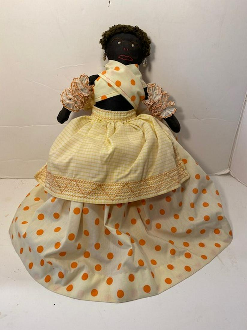 Black Female Toaster Cover: Title: Black Female Toaster Cover Dimension: 19.5” tall and 10” wide Provenance/Additional Info:Stylistic Older Black toaster cover, artistically made, nice facial expression, realistic hair, pear