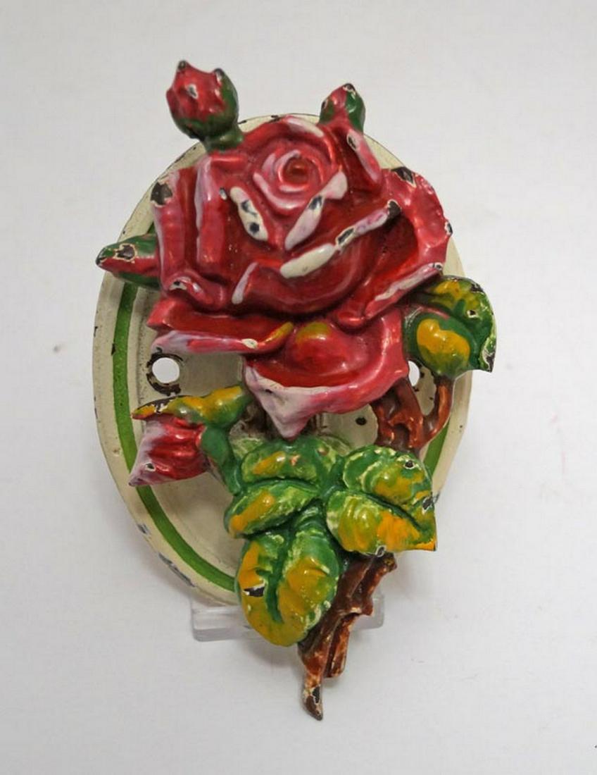 Antique Rose Flower Cast Iron Doorknocker: Title: Antique Rose Flower Cast Iron Doorknocker Date: Circa 1920's-30's. Dimension: 5 " tall x 3" wide/ Provenance/Additional Info: Delightful beautifully painted single Stem Rose with four Rose Buds