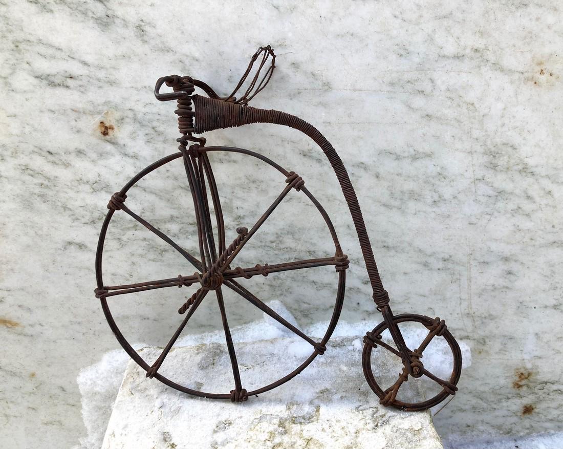 Mid 20thc wire art of a penny farthing bicycle: Title: Mid 20thc wire art of a penny farthing bicycle Dimensions: Approximately 6 1/2" high and 7" long. Shipping: Domestic: Flat-rate of $12.00 to anywhere within the contiguous U.S. International: F