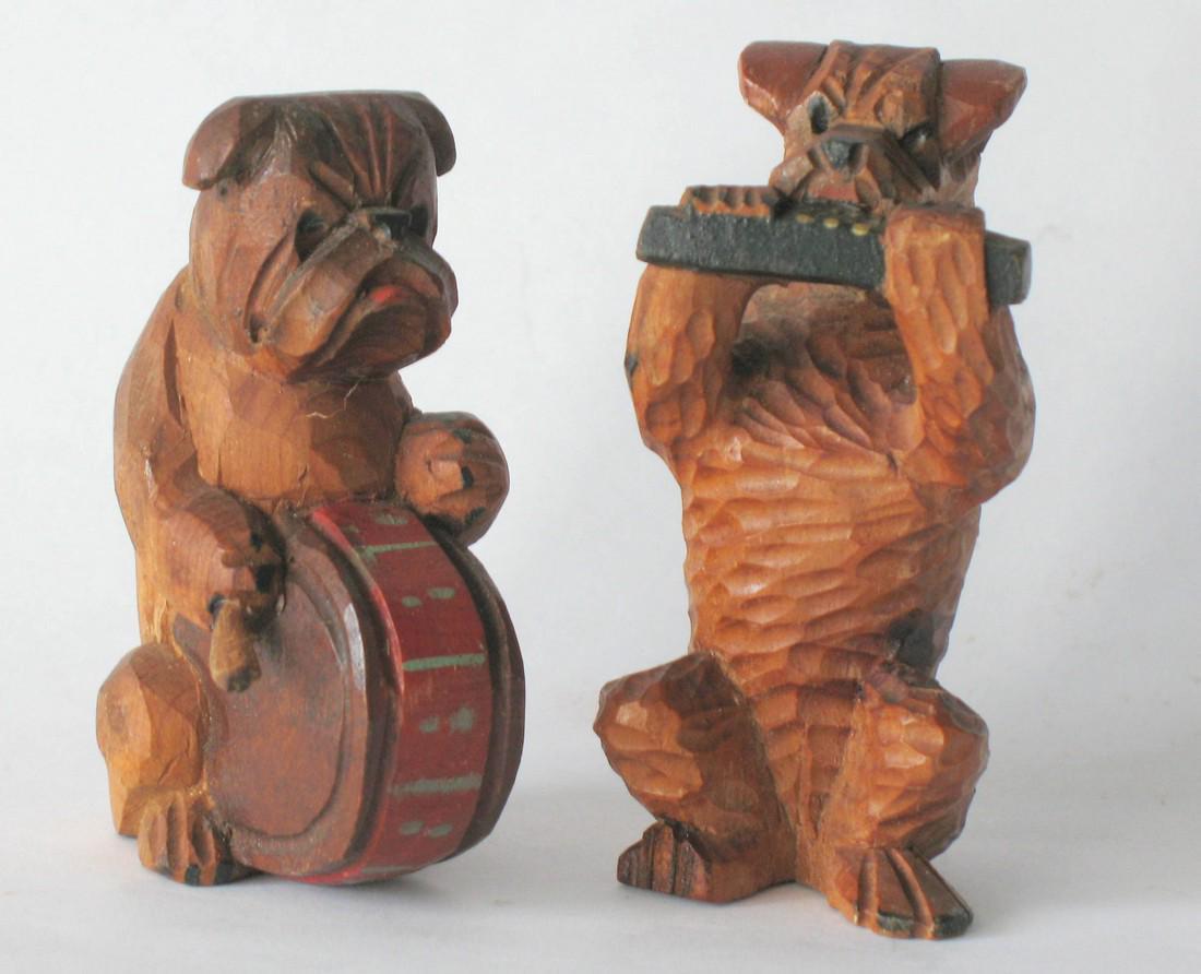 Vintage wood carving of two dogs.: Title: Vintage wood carving of two dogs. Description: Whimsical folk art wood carvings of 2 dogs, one beating a drum and the other playing a harmonica. All original paint & condition. Dimension: 2 3/4