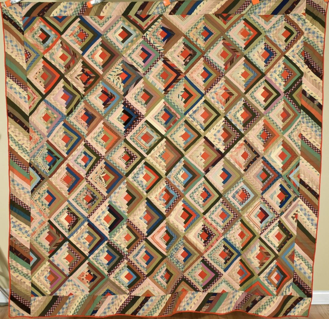 Wool 1870's Log Cabin Quilt, Piano Key Border: 1870's wool light/dark log cabin quilt, hand pieced, with a piano key border. The quilt measures 80" X 82" and is in very good condition, with the occasional moth nibble (mostly at the binding edge) a