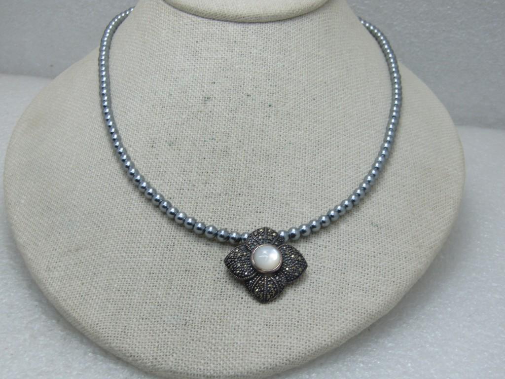 Vintage Sterling Floral Marcasite & Mother-of-Pearl: Vintage Sterling Floral Marcasite & Mother-of-Pearl Necklace, 17" 4mm Faux Silver Tahitian Pearls. The pendant is a 1" four-petal blossom with a raised 9mm mother-of-pearl round cabochon that is bezel