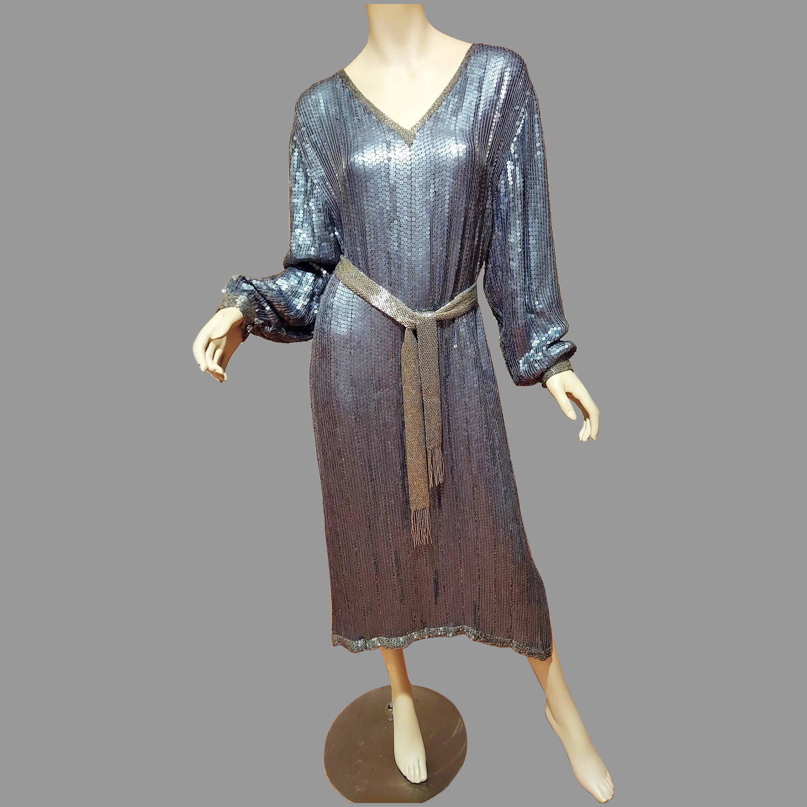 Vtg Flapper dress silver gun metal silk sequin beaded: This one is amazing in silver gun metal colored sequins allover every inch of this dress. Also beadings and beaded belt with fringes. slits on sides silk. beadings on the sleeves with rhinestone butto
