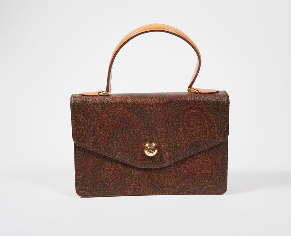 Etro paisly hand cutch bag: Title: Etro paisly hand cutch bag Brand: ETRO Date/Period: N/A Materials: Canvas Measurement: L:10.5 W: 2" H: 7" Additional Information: Etro paisly hand cutch bag Reserve: $60.00 Shipping: Domestic: