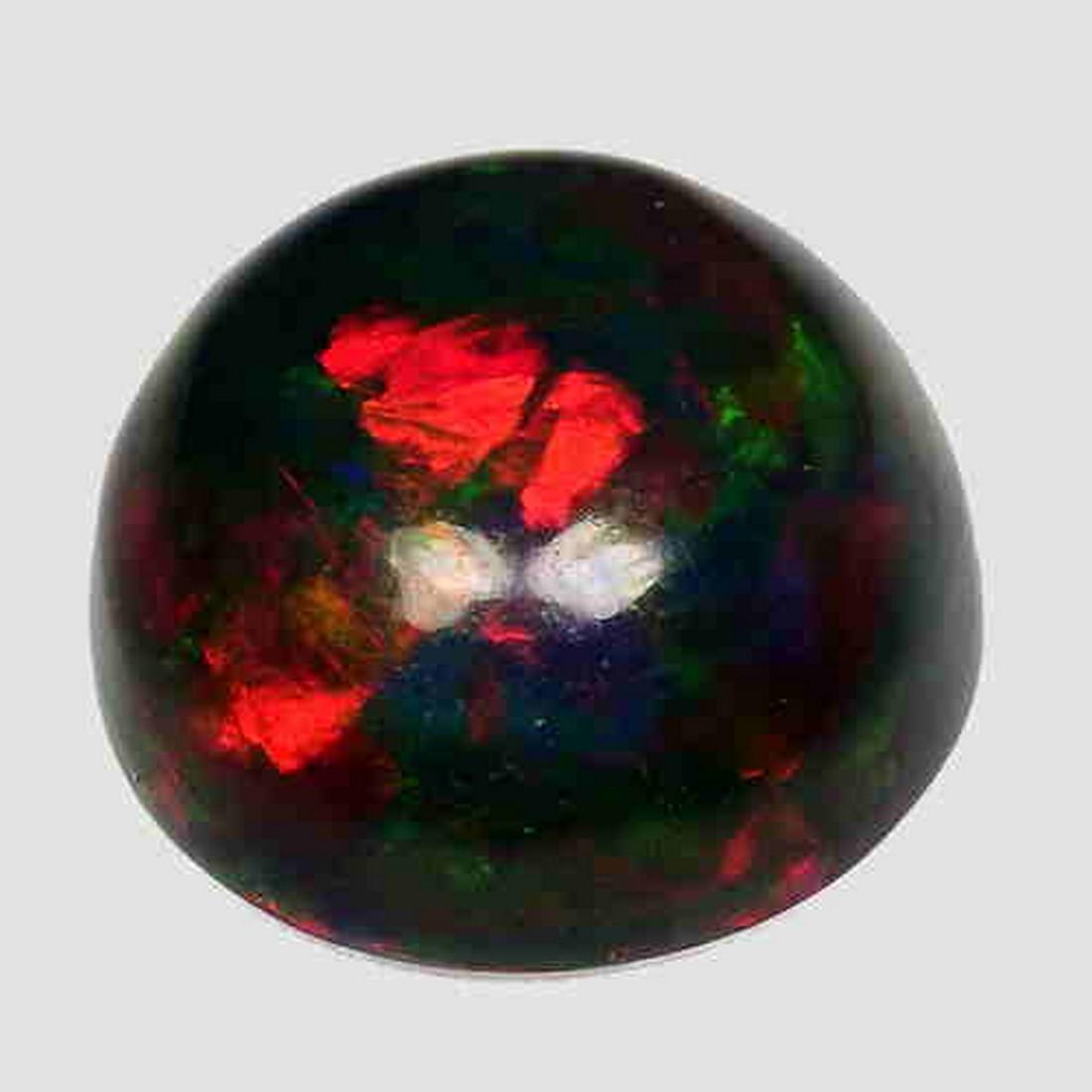 0.96 CTS NATURAL ETHIOPIAN BLACK OPAL ROUND SHAPE LOOSE: Title: 0.96 CTS NATURAL ETHIOPIAN BLACK OPAL ROUND SHAPE LOOSE GEMSTONES Carat Weights: 0.96 Size/Dimensions: 6.9 x 6.9 x 3.8 MM Reserve: $10.00 Shipping: Domestic: Flat-rate of $10.00 to anywhere wit