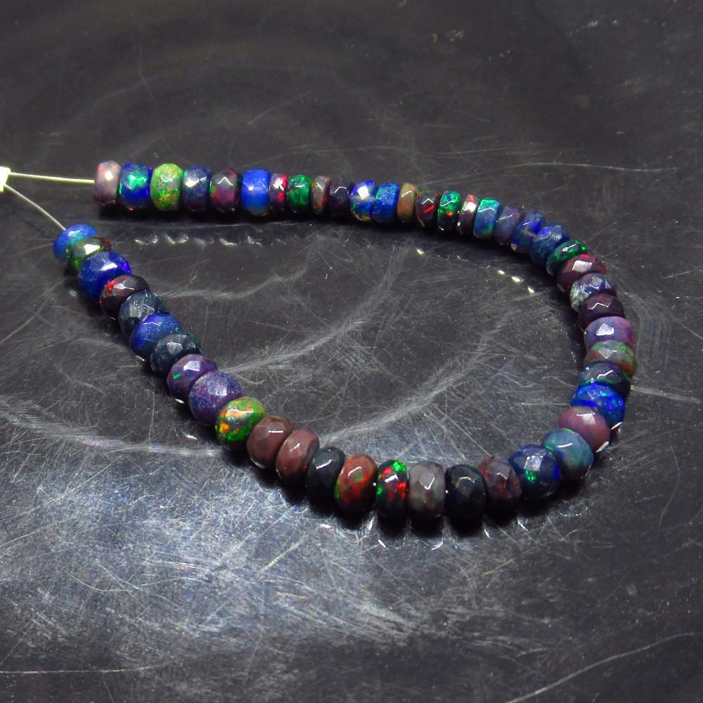 12.69 Ct Natural 49 Drilled Faceted Black Opal Beads: Title: 12.69 Ct Natural 49 Drilled Faceted Black Opal Beads Stone Clarity: Translucent Gemstones: Natural Faceted Black Opal Beads Carat Weights: 12.69 Size/Dimensions: 4.00 to 4.80 mm / 49 PC's Addit
