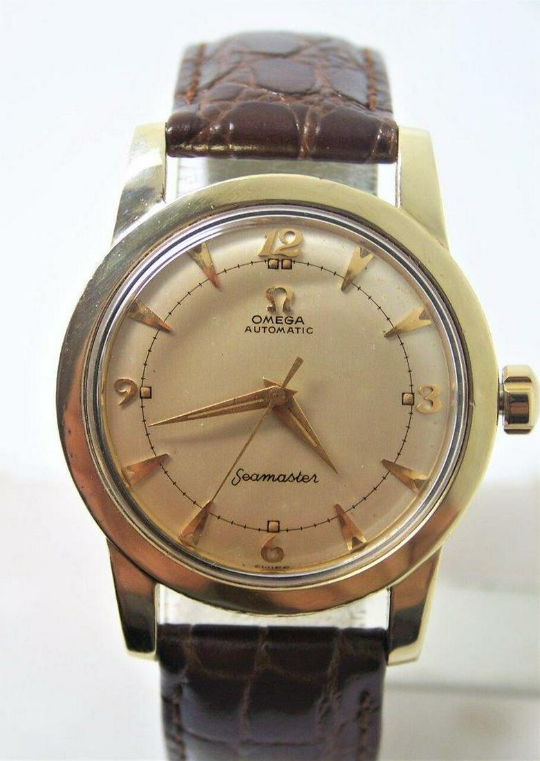 Vintage 14k Gold Cap OMEGA SEAMASTER Automatic Watch: Vintage 14k Gold Cap OMEGA SEAMASTER Automatic Watch Cal 354 c.1950s in Excellent Condition! Serviced? This Mens Omega watch is Swiss made. Great present for yourself or someone you love as well as fo