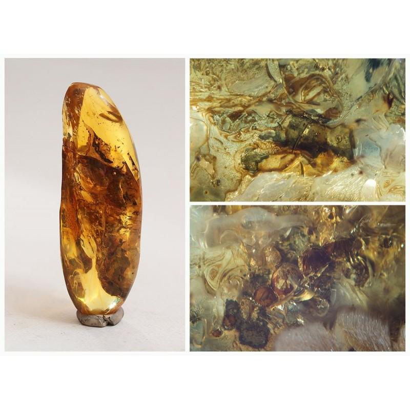 47g Baltic amber stone fossil insects ant inclusion: There are several inclusion in the stone. Weight: 47 gram (1,65 oz) Size: 26x32x99 mm Inclusion: most likely a ant (Formicidae) and other Age: 45-50 million years old Stone: 100% natural Baltic amber 
