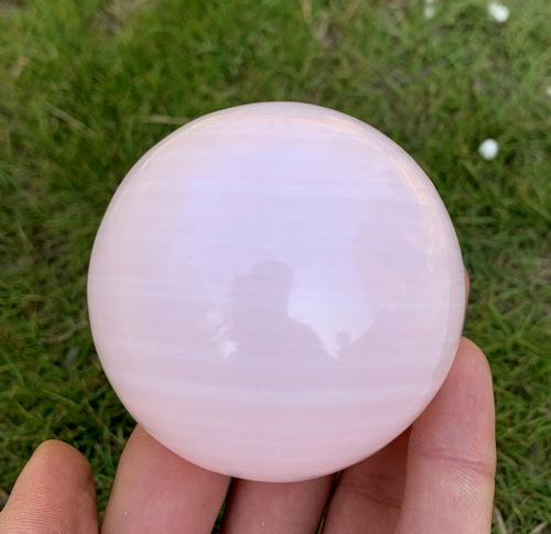 425 Gram High Quality Natural Pink Calcite`Sphere: Title: 425 Gram High Quality Natural Pink Calcite`Sphere Healing Mineral Treatment: Natural Weight: 425 Gram Size/Dimensions: 65 mm Origin: Pakistan Reserve: $30.00 Shipping: Domestic: Flat-rate of $2
