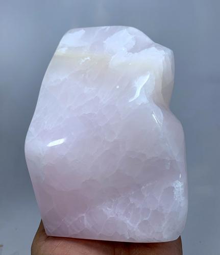 1105 Gram Top Quality Light Pink Calcite Tumble Healing: Title:1105 Gram Top Quality Light Pink Calcite Tumble Healing Stone Weight: 1105 Gram Size/Dimensions: 150x82x64 mm Origin: Pakistan Reserve: $100.00 Shipping: Domestic: Flat-rate of $45.00 to anywher