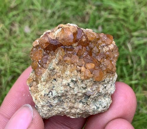 31 Gram Beautiful Natural Hessonite Garnet Specimen: Title: 31 Gram Beautiful Natural Hessonite Garnet Specimen Treatment: Natural Weight: 31 Gram Size/Dimensions: 33x29x17 mm Origin: Pakistan Reserve: $15.00 Shipping: Domestic: Flat-rate of $15.00 to a