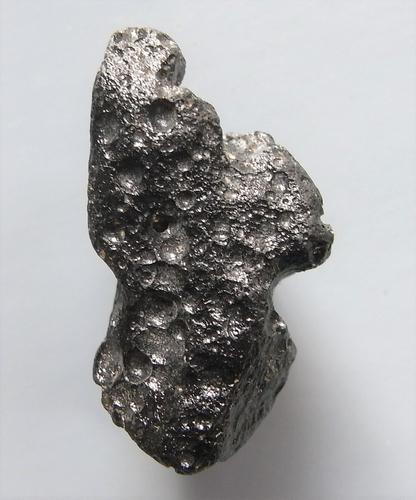 PHILIPPINITE TEKTITE - FROM METEORITE IMPACT: Title: PHILIPPINITE TEKTITE - FROM METEORITE IMPACT Origin: Paracale, Camarines Norte, Luzon, Philippines Size: 2.5x1.5x1 cm / 6 gram Additional Information: flattened rizalite/philippinite tektite wi