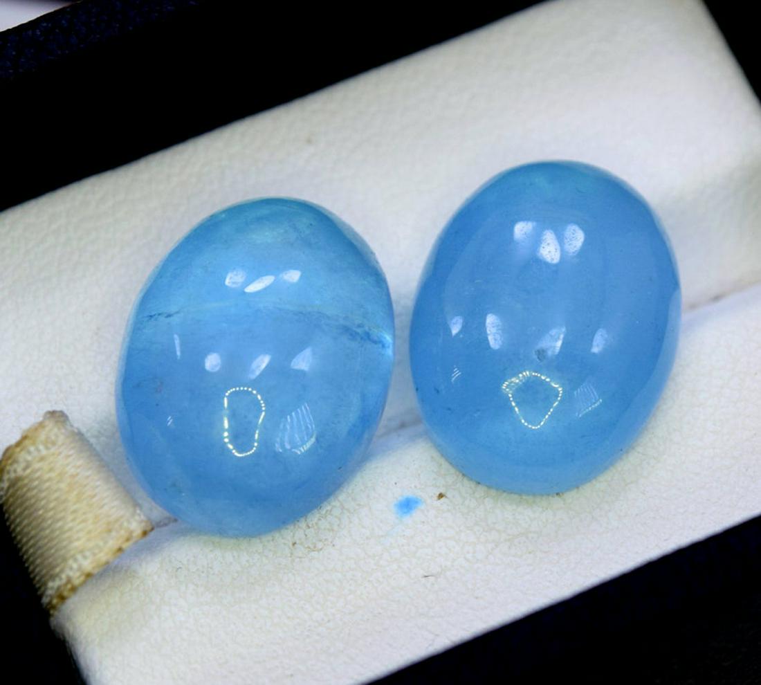 Aquamarine Gemstone , Natural Deep Blue Color Pair of: Materials: Aquamarine Carat weight: 25.00 Description Aquamarine Gemstone , Natural Deep Blue Color Pair of Aquamarine Cabochon Gemstone - Weight : 25.00 Carat Size : 16*13*7 mm Origin : Pakistan Trea