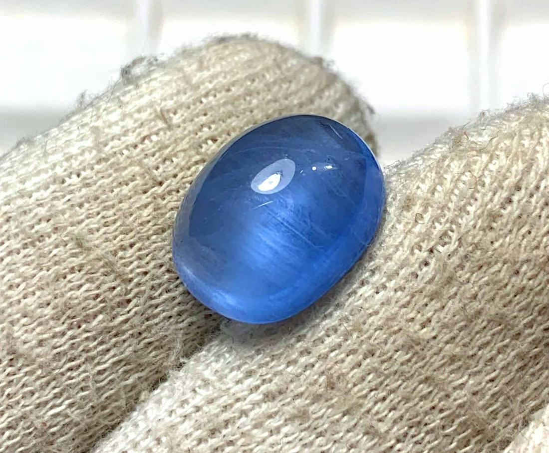 Cat's Eye Natural Aquamarine Cabochon Gemstone Deep: Materials: Gem type: Aquamarine Carat weight: 7.15 Description Cat's Eye Natural Aquamarine Cabochon Gemstone Deep Blue Color Weight - 7.15 Carats Dimensions - 13.4*10.6*7.2 mm DHL E Commerce SHIPPING