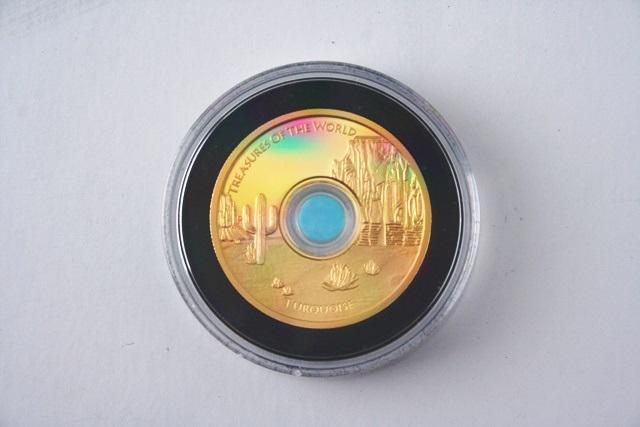 2015 - 24k Gold Australian Treasure Of The World: Title: 2015 - 24k Gold Australian Treasure of the World Date/Period: 2015 Material: Gold Description: 1 set available ! This beautiful gold coin celebrates turquoise, a gemstone prized and admired by