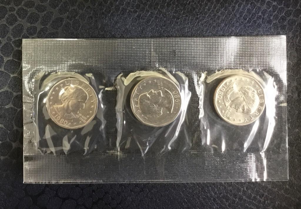 The 1980 Dollar Souvenier Set: Title: The 1980 Dollar Souvenier Set Date/Period: 1980 Material: .75 copper, .25 nickel, clad to pure copper core Description: The obverse features the lifelike portrait of Susan B. Anthony, created b