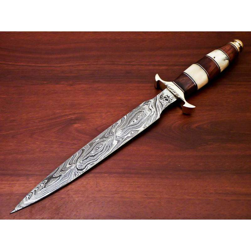 Hunting exclusive damascus steel knife camel bone wood: Knife "Norwood" • Blade - damask steel • Handle – camel bone, natural wood • Scabbard – leather (included) • Blade hardness – 58-60 HRC • Total length – 387 mm. • Blade length – 