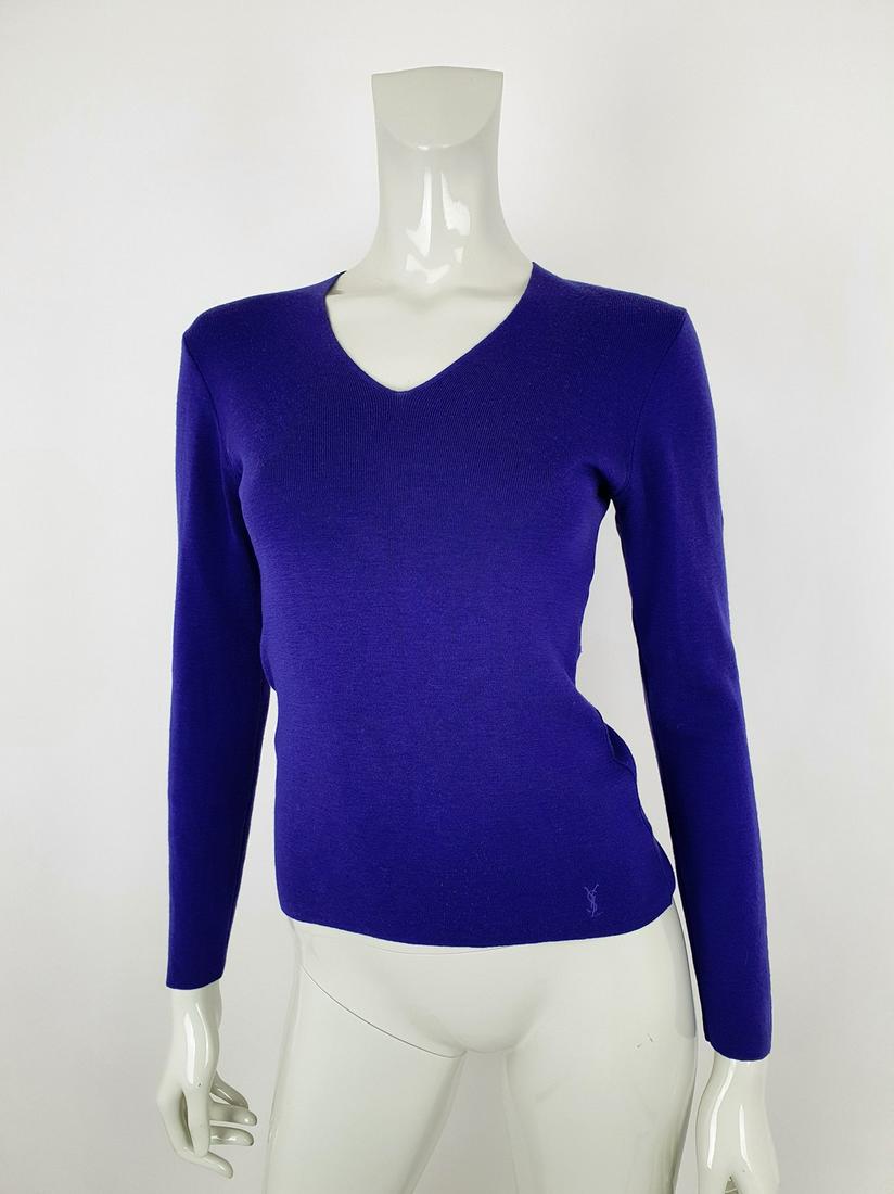 Yves Saint Laurent cardigan: No Reserve! Title: Yves Saint Laurent cardigan Date/Period: 1990-2000 Dimension: Length 57cnArmpit to Armpit 44cmSleeve 58cm Material: Wool Additional Information: Exclusive Yves Saint Laurent kobalt