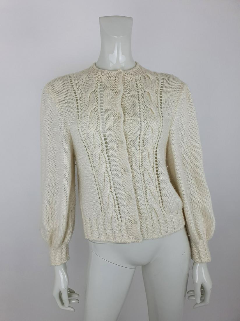 Emilio Pucci Cardigan: No Reserve! Title: Emilio Pucci Cardigan Date/Period: 1980 Dimension: Length 53cmArmpit to Armpit 53cmSleeve 57cm Material: Wool Additional Information: Exclusive vintage Emilio Pucci wollen Cardigan