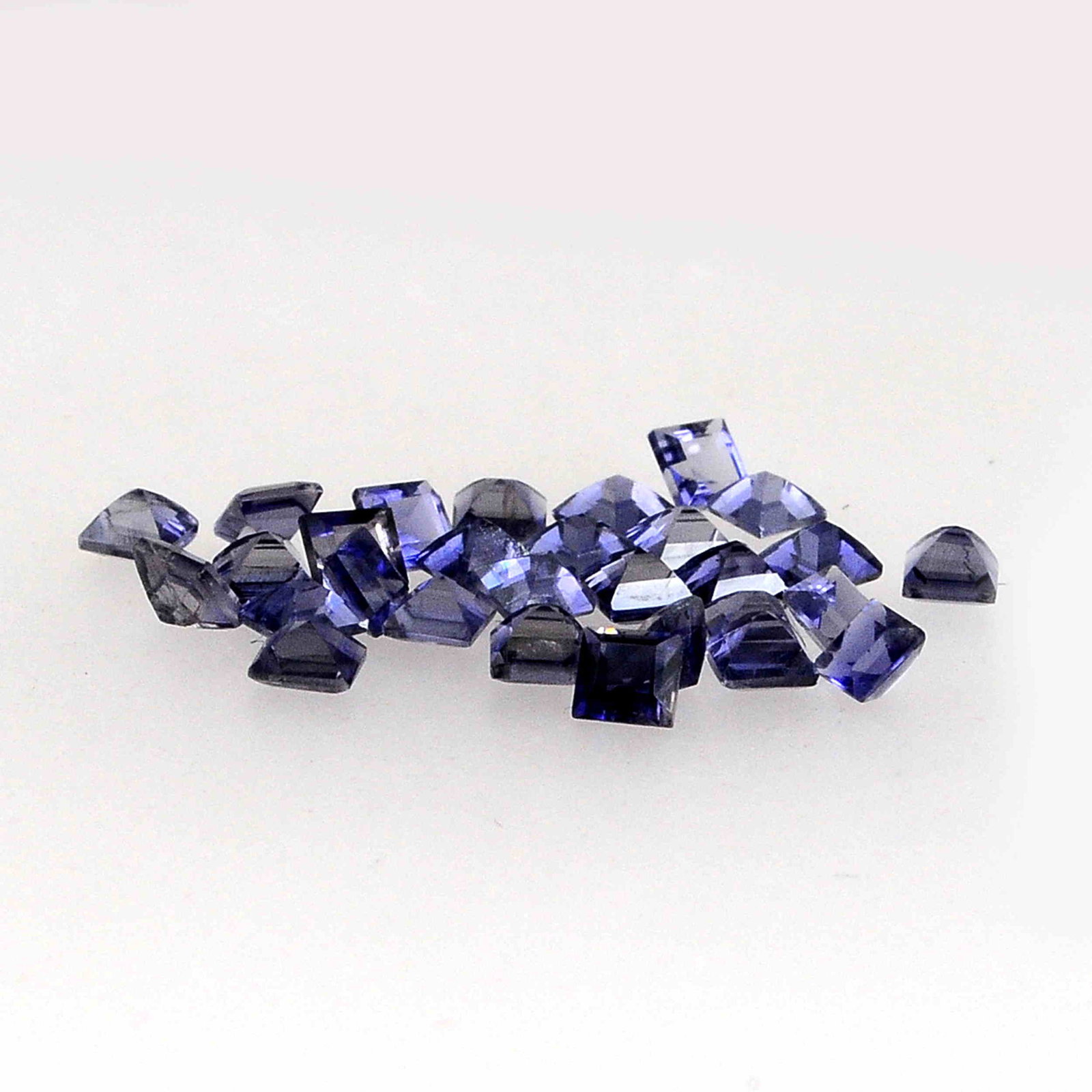 4.35 Carat Dark Blue Color Natural Square Iolite Loose: No Reserve! Title: 4.35 Carat Dark Blue Color Natural Square Iolite Loose Gemstone 29 Pieces Brand: Gems Trading Center Gemstones: Iolite Carat Weights: 4.35 Size/Dimensions: 2H x 3W x 3L mm Shipping:
