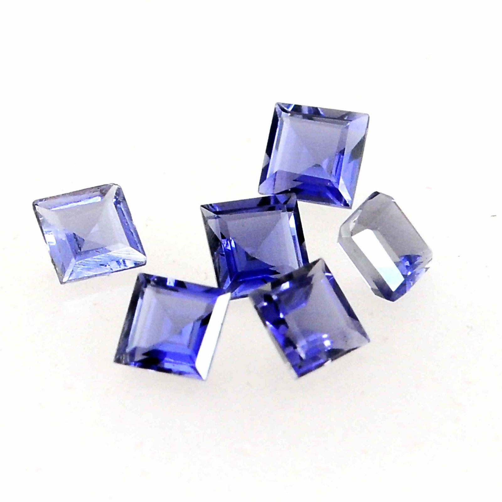 1.66 Carat Dark Blue Color Natural Square Iolite Loose: No Reserve! Title: 1.66 Carat Dark Blue Color Natural Square Iolite Loose Gemstone 6 Pieces Brand: Gems Trading Center Gemstones: Iolite Carat Weights: 1.66 Size/Dimensions: 2H x 4W x 4L mm Shipping: