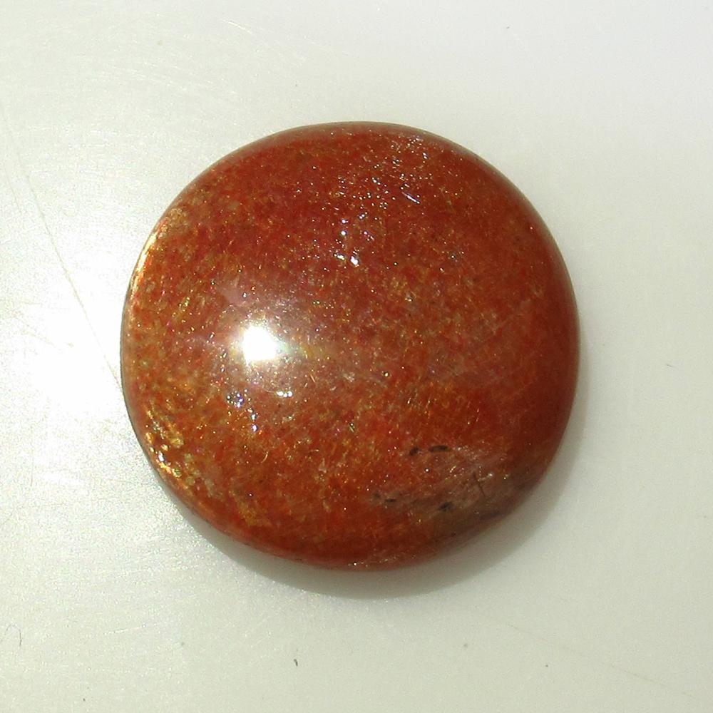 19.43 Ct Natural Orange Sunstone Round Cab: No Reserve! Title: 19.43 Ct Natural Orange Sunstone Round Cab Stone clarity:Opaque Gemstones: Natural Sunstone Carat weights: 19.43 Size/Dimensions: 19.40 x 19.40 x 7.00 mm Additional Info:Excellent R