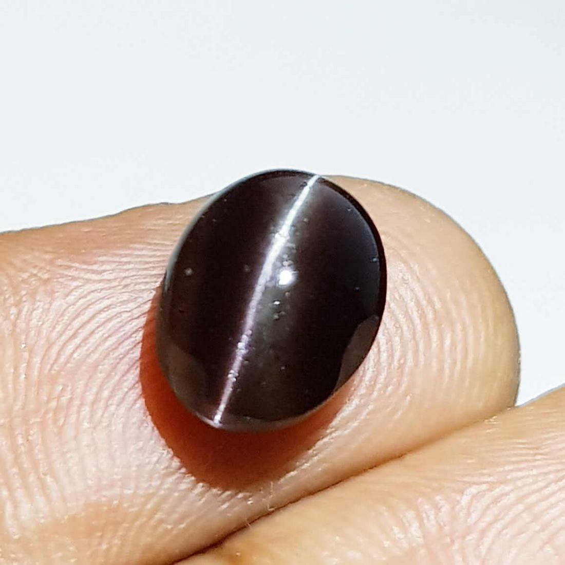 Natural Scapolite Cat's Eye 3.42 ct: No Reserve! Title: Natural Scapolite Cat's Eye 3.42 ct Color clarity:Opaque Gemstones: Loosegemstone Carat weights: 3.42 Size/Dimensions: 10.70 x 8.30 x 5.40 Additional Info:Oval - Africa Shipping: Do