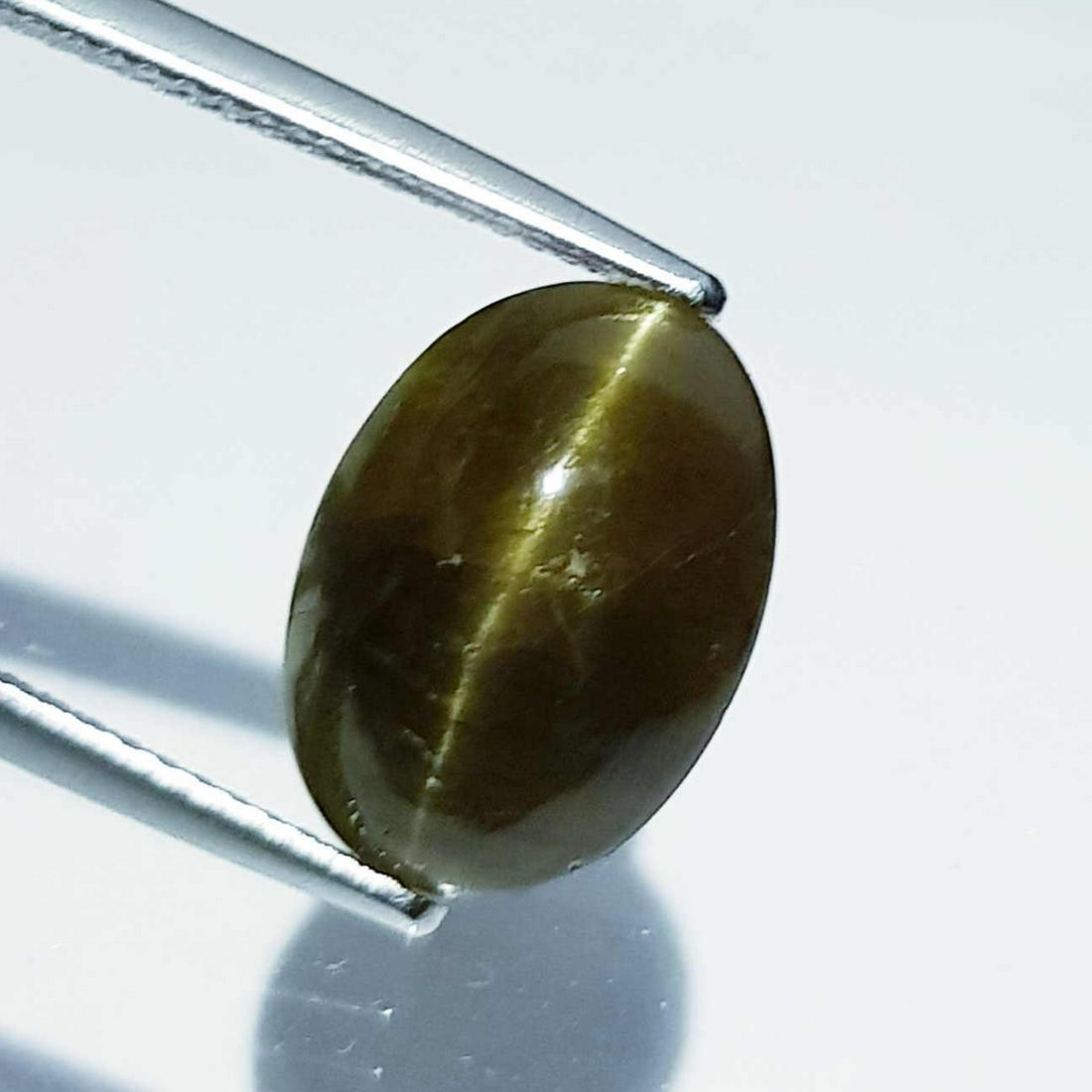 Natural Apatite cat's Eye 7.16 ct: No Reserve! Title: Natural Apatite cat's Eye 7.16 ct Color clarity:Opaque Gemstones: Loosegemstone Carat weights: 7.16 Size/Dimensions: 13.20 x 9.70 x 6.60 Additional Info:Oval - Srilanka Shipping: Do