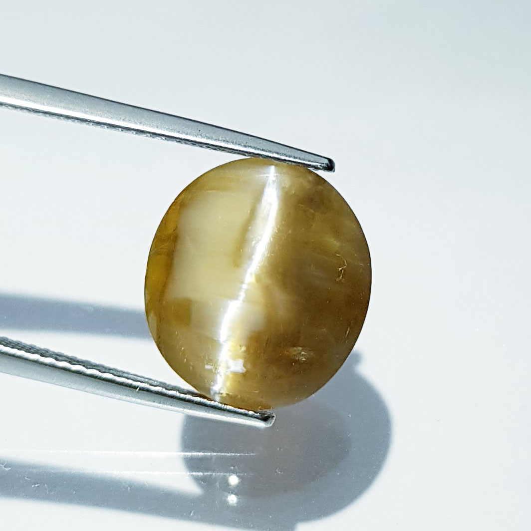 7.16 ct Natural Opal Cat's Eye: No Reserve! Title: 7.16 ct Natural Opal Cat's Eye Color clarity:Semi Transparent Gemstones: Loosegemstone Carat weights: 7.16 Size/Dimensions: 14.80 x 13.50 x 7.10 Additional Info:Oval - Africa Shippi
