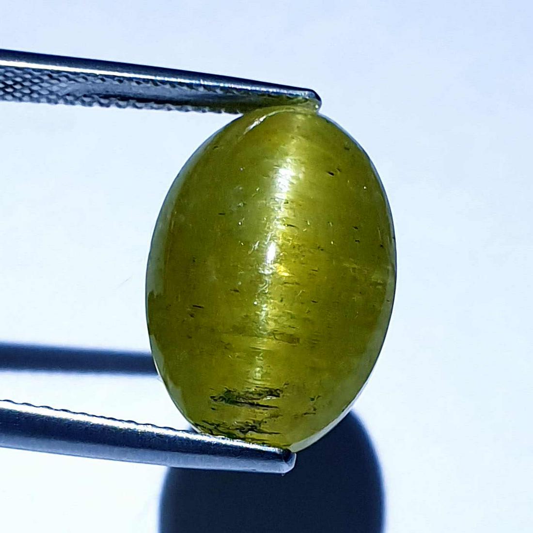 Natural Apatite cat's Eye 19.34 ct: No Reserve! Title: Natural Apatite cat's Eye 19.34 ct Color clarity:Opaque Gemstones: Loosegemstone Carat weights: 19.34 Size/Dimensions: 17.70 x 12.00 x 10.30 Additional Info:Oval - Srilanka Shipping