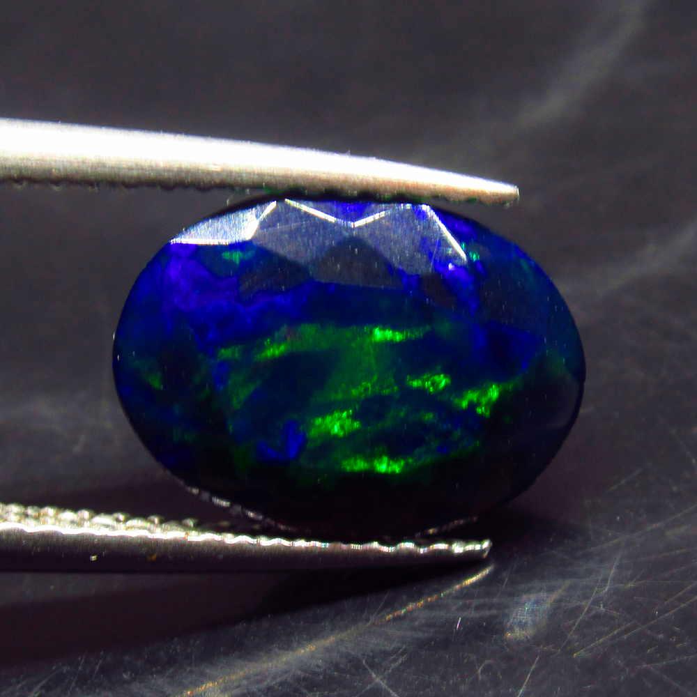 1.81 Ctw Natural Ethiopian Black Fire Opal Oval Cut: No Reserve! Title: 1.81 Ctw Natural Ethiopian Black Fire Opal Oval Cut Stone clarity:Opaque Gemstones: Black Opal Carat weights: 11.40 x 8.40 x 4.70 mm Size/Dimensions: 1.81 Additional Info:Excellent 