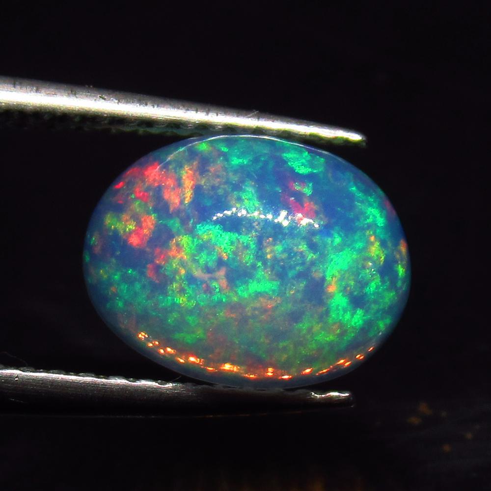 1.47 Ct Natural Ethiopian Multicolor Opal Oval Cab (1 of 2)