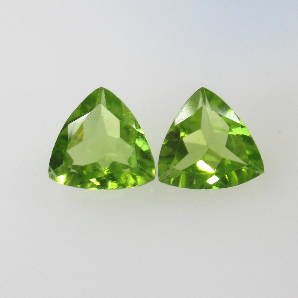 2.00 Ct Natural Peridot Trillion Pair: No Reserve! Title: 2.00 Ct Natural Peridot Trillion Pair Stone Clarity: VVS Gemstone: Natural Peridot Carat Weight: 2.00 Size/Dimensions: 7.10 x 7.00 x 3.30 mm / 2 PC's Additional Information: Top Cla
