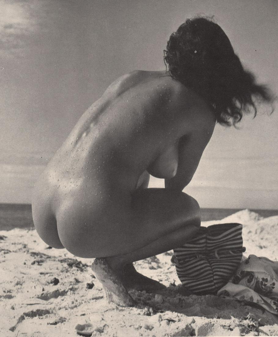 ANDRE DE DIENES - Nude at the Florida Coast: Artist: ANDRE DE DIENES Print Title: Nude at the Florida Coast Medium: Photoengraving Printed 1950’s in the UK Image size (inches) approx. 7 x 6” Andre De Dienes was a professional photographer, e