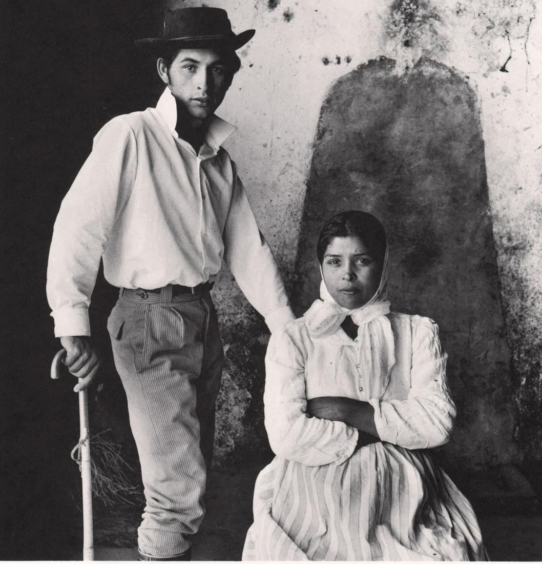 IRVING PENN - Young Married Gypsy Couple of: Artist: IRVING PENN Print Title: Young Married Gypsy Couple of Extremadura, Spain Medium: Photoengraving Printed 1970’s in the US Image size (inches) approx. 6 x 6” Irving Penn was an American pho