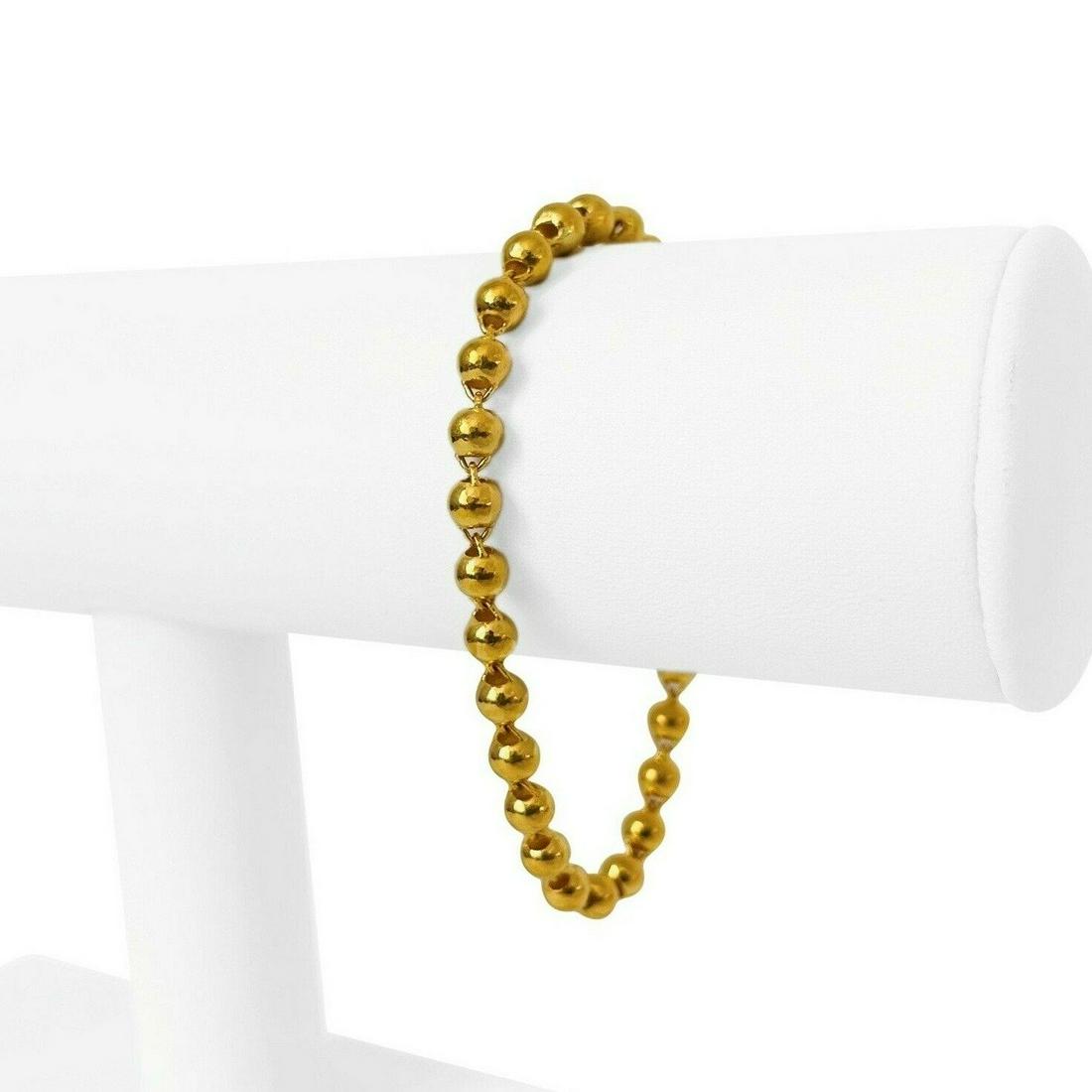 24k Pure Yellow Gold 9.5g Ladies Ball Bead Link Chain: Condition: Excellent Condition, Professionally Cleaned and Polished Metal: 24k Gold (Marked, and Professionally Tested) Weight: 9.5g Length: 7 Inches Width: 5mm Closure: Hook Markings: "999" (24k) and